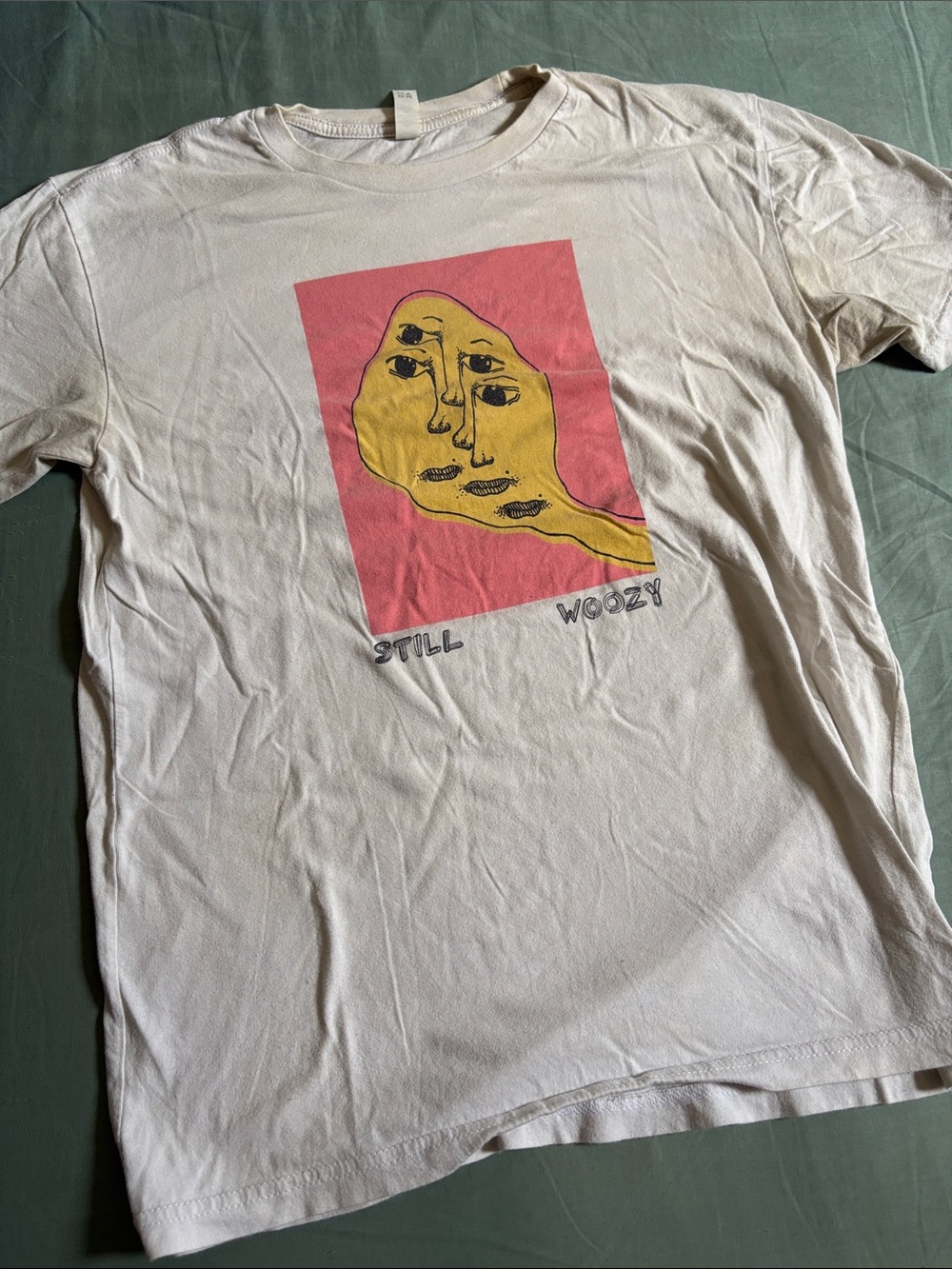 Next Level Apparel White Tee with Pink Panel & Yellow Face Graphic